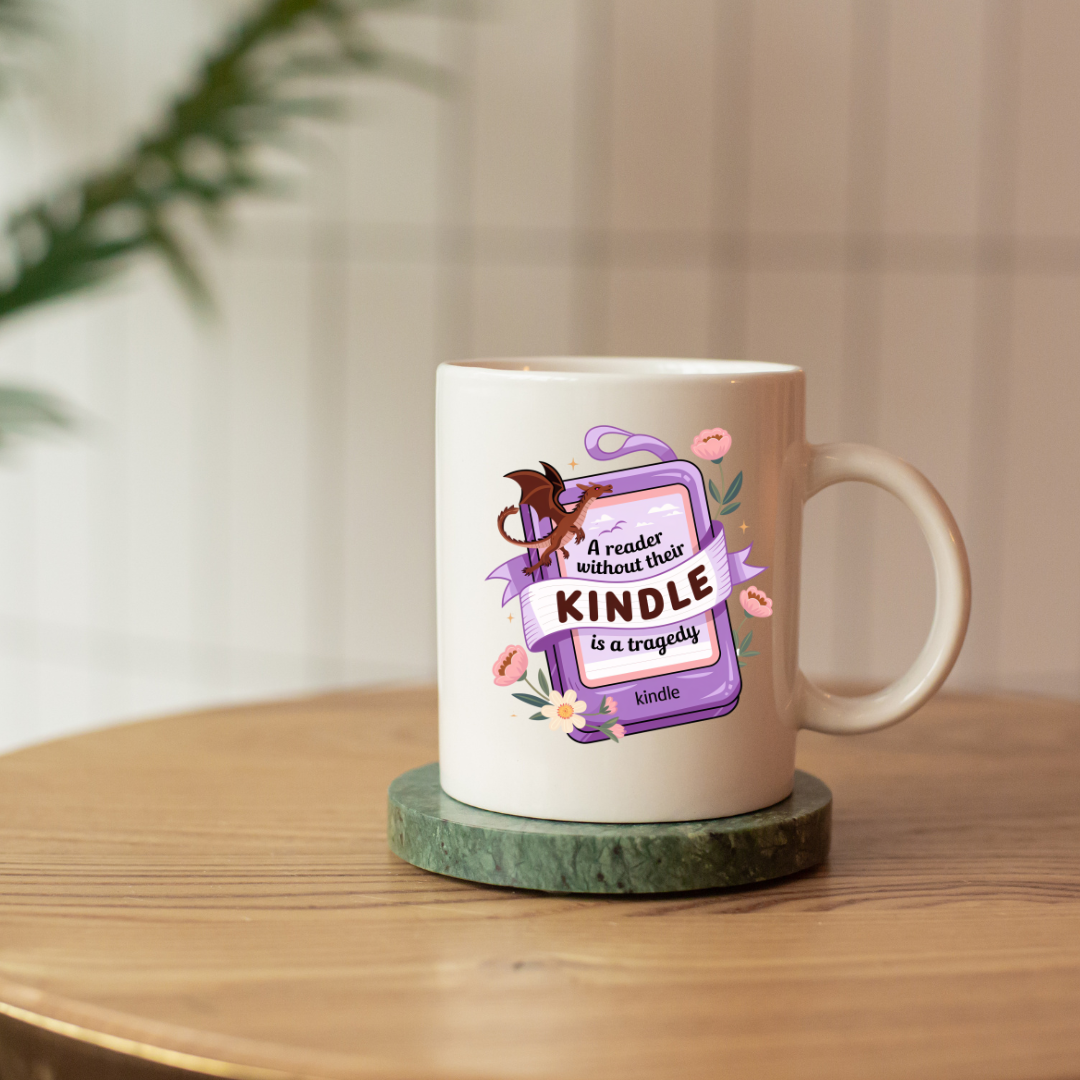 Mug with a Kindle-themed design on a wooden surface